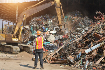 Recycling industry a worker who recycling thing on recycle center.Manager and Manual Worker in...