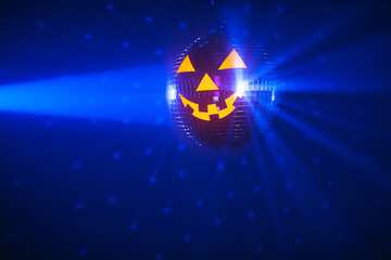 Halloween party pumpkin disco ball, blue shiny rays background