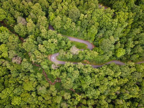 Aerial View of Winding Mountain Road in Appalachian Mountains of North Carolina in the Summer