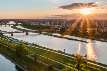 sunset over the river in the city