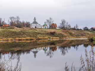 Obraz premium The Tura River and the Church of the Savior Image Not Made by Hands. The village of Krasnogorskoe. Verkhotursky district. Sverdlovsk region. Russia