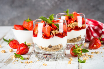Greek yogurt with fresh strawberry and granola. Parfait.
