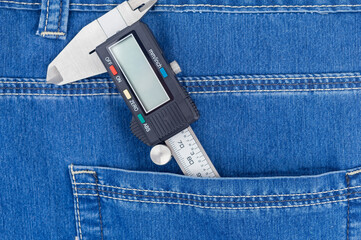 digital caliper in new jeans pocket
