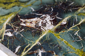 Diabase green stone texture. Construction, building cladding.