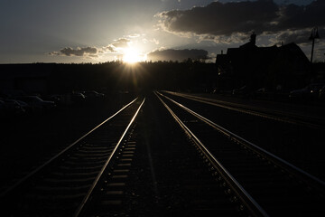 Fototapeta na wymiar train tracks at sunset