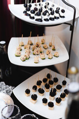 Hors d'oeuvres on platters at a fancy dinner party