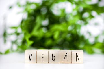 Vegan concept and veganism lifestyle, Vegan text on white background eating green biological...