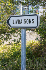 French "Deliveries" road sign, indicating where the deliveries of goods are