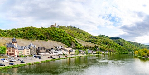 Fototapeta na wymiar Bernkastel-Kues. Beautiful historical town on romantic Moselle, Mosel river. City view with a castle Burgruine Landshut on a hill. Rhineland-Palatinate, Germany