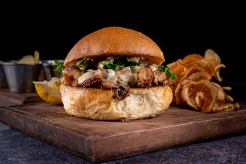 Delicious octopus burger with chips