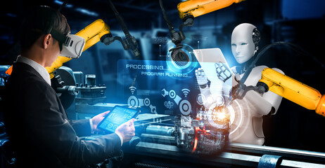 Mechanized industry robot and human worker working together in future factory . Concept of...