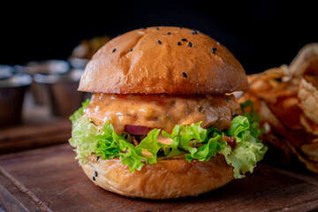 Exquisite classic hamburger with chipotle dressing