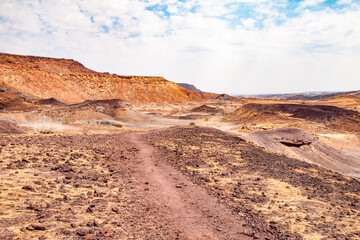 Unique landscape around Burnt Mountain, Afrikaans: Verbrande Berg, hill with a solidified lava flow near Twyfelfontein in Damaraland, Namibia, Africa