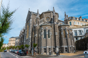 Fototapeta premium The beautiful Sainte-Eugénie Church of Biarritz on a summer afternoon. Municipality of Biarritz, department of the Atlantic Pyrenees. France