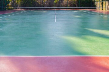 New concrete tennis courts available. With the morning sun