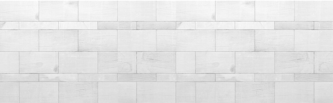 Panorama of White granite building exterior wall tile pattern and background seamless
