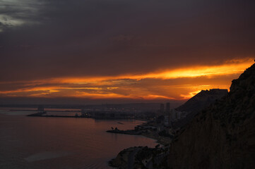 beautiful and colorful sunset in the city of Alicante, located in the Valencian Community, Spain
