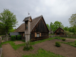 Fototapeta na wymiar Traditional Kashubian village in Pomerania (northern Poland) with typical rural architecture for central Europe