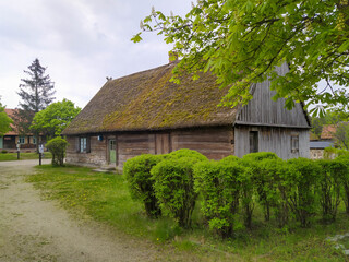 Fototapeta na wymiar Traditional Kashubian village in Pomerania (northern Poland) with typical rural architecture for central Europe