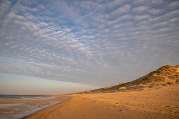 Fototapeta na wymiar Fraserburgh Sand Dunes against Herringbone Sky