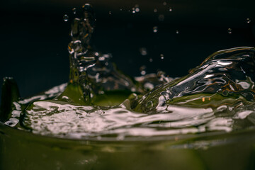 splash Summer refreshing drink with cucumber and mint. Top view with copy space