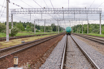 Obraz premium Tank cars on railway tracks. Individual tank cars stand on rails.