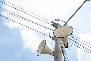 A radio station was installed on an electric pole in a rural village. For use in public relations...