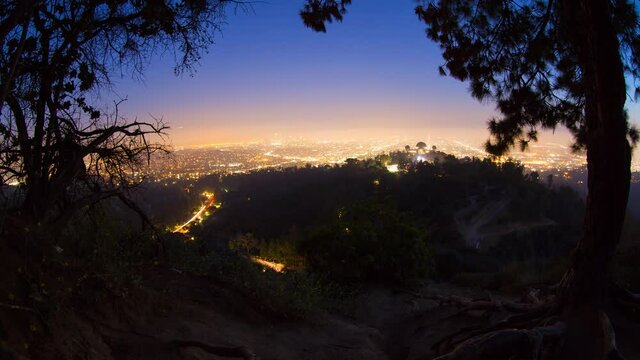 Lockdown Time Lapse Shot Of Illuminated Griffith Park In City, Famous Landmark Against Clear Sky - Los Angeles, California