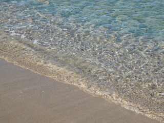 A beautiful sandy beach with clear waters, in Attica, Greece