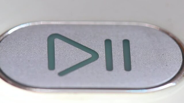 play pause button, macro close up. symbol