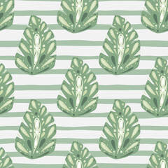 Green palette seamless pattern with folk monstera leaves. Striped background. Tropical backdrop.