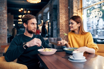 cheerful young couple communication restaurant leisure lifestyle