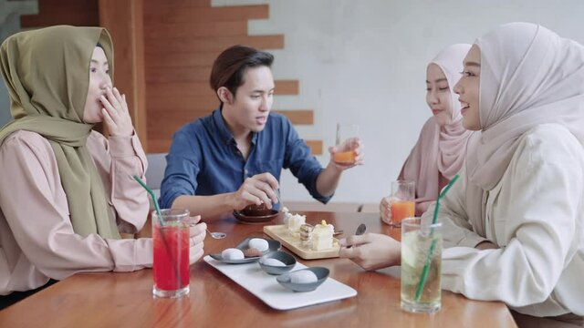 50p frame rate footage of dessert table, friends meeting Muslims after the month of Ramadan

