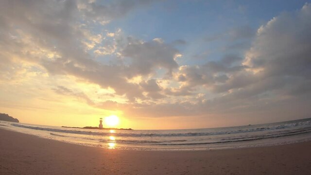 Beautiful Colorful Sunset At Sea With Cloudy Sky. Sunlight Shine On Water Ocean With Waves Ripping On Sandy Shore, Nature Color Of Cloud And Sun Down At  Horizon. Paradise Of Thailand Nature Landscape