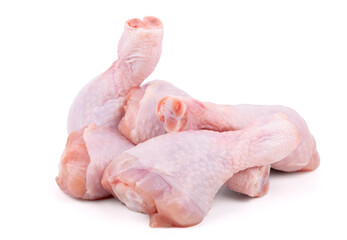group of raw chicken drumsticks isolated on white background