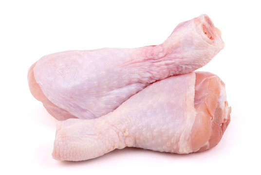 Two Raw Chicken Drumsticks Isolated On White Background