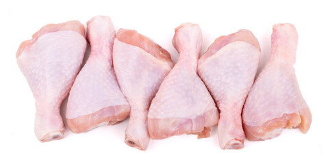 group of raw chicken drumsticks isolated on white background © Aleksei