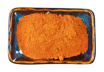 chili powder from cayenne pepper in bowl cutout