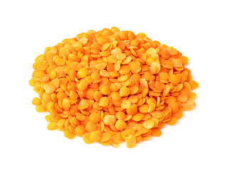 handful of split red lentils closeup on white