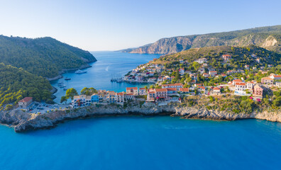 Aerial view of Assos in island of Cefalonia, Ionian, Greece. Aerial drone photo of beautiful and picturesque colorful traditional fishig village