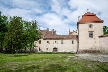 Fototapeta na wymiar Zhovkva, Ukraine - 20.05.2021: The part of Zhovkva Castle, outdoor yard. It was founded by Polish Hetman Stanisław Żółkiewski as his fortified residence.