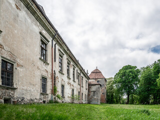 Zhovkva, Ukraine - 20.05.2021: The part of Zhovkva Castle, outdoor yard. It was founded by Polish Hetman Stanisław Żółkiewski as his fortified residence.