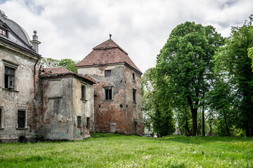 Fototapeta na wymiar Zhovkva, Ukraine - 20.05.2021: The part of Zhovkva Castle, outdoor yard. It was founded by Polish Hetman Stanisław Żółkiewski as his fortified residence.