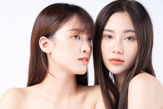 Beauty portrait of two beautiful young Asian girls