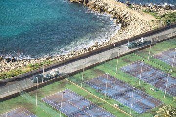 ALICANTE, SPAIN, APRIL 28 2021: police towing badly parked cars in the city of Alicante, in the...