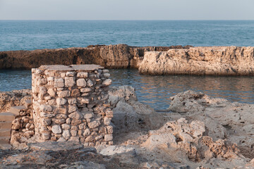 Coastal view with ruined stone towers