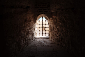 Window with bars in the old fortress