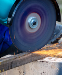 Sparks from metal cutting at a construction site. Technologies