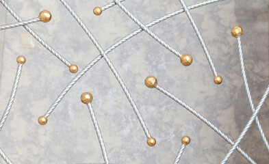 Gold-plated metal balls as decoration in the house. Close-up