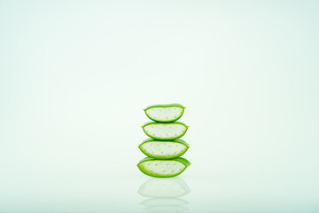 sliced of fresh aloe vera leaf on white background